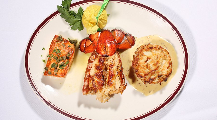 Chops Lobster Bar signature dishes Maryland Style Jumbo Lump Crab Cakes
Bone-in Ribeye
Lobster Tail
